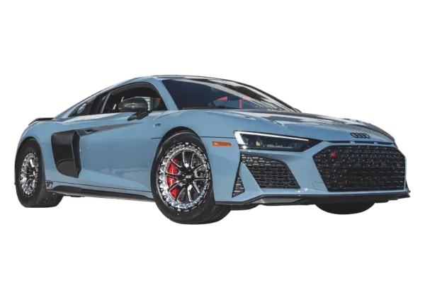 A sleek blue Audi R8 with stylish chrome wheels and red brake calipers, showcasing its sporty design and powerful presence.