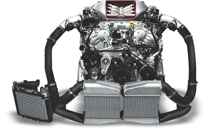 A high-performance car engine with chrome parts, twin turbos, and dual intercoolers, showcasing intricate automotive engineering.